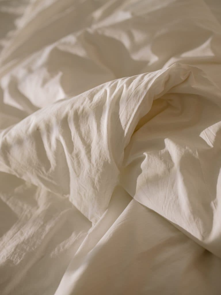 What is the difference between bed sheet and bed cover?